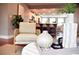 Cozy living space showcasing modern decor with a view of the open kitchen and dining area at 3419 W Empedrado St, Tampa, FL 33629