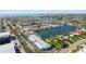 Expansive aerial view of the neighborhood waterfront with lush greenery and picturesque waterfront homes at 3717 46Th S Ave # 7, St Petersburg, FL 33711