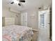Bedroom featuring wood floors, a white dresser and an ensuite bathroom at 3717 46Th S Ave # 7, St Petersburg, FL 33711