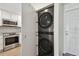 Convenient laundry area with modern stacked washer and dryer units at 3717 46Th S Ave # 7, St Petersburg, FL 33711