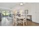 Cozy living area with modern furnishings and seamless flow into the dining space at 3717 46Th S Ave # 7, St Petersburg, FL 33711