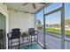 Enclosed porch offering a relaxing seating area with waterfront views and natural light at 3717 46Th S Ave # 7, St Petersburg, FL 33711