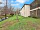 Exterior view of a home showing the lush backyard and outdoor space at 4524 Southampton Ct # 4524, Tampa, FL 33618