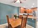 Cozy dining area adjacent to the kitchen with wood table and chairs at 4524 Southampton Ct # 4524, Tampa, FL 33618