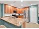 Updated kitchen with stainless steel appliances, granite countertops, and ample storage at 4524 Southampton Ct # 4524, Tampa, FL 33618