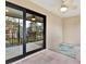 Enclosed lanai featuring tile flooring and a ceiling fan at 4524 Southampton Ct # 4524, Tampa, FL 33618