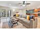 Inviting living room with comfortable seating and sliding glass doors to the balcony at 4524 Southampton Ct # 4524, Tampa, FL 33618