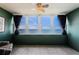Bright bedroom with large windows and a beautiful bay view at 4525 Cove Cir # 705, St Petersburg, FL 33708