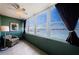 Bright bedroom with large windows and coastal view at 4525 Cove Cir # 705, St Petersburg, FL 33708