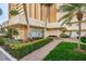 Exterior view of the community center, with well-maintained landscaping at 4525 Cove Cir # 705, St Petersburg, FL 33708