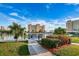 Well-manicured grounds with view of the buildings at 4525 Cove Cir # 705, St Petersburg, FL 33708