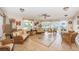 Comfortable community center seating area with abundant natural light and tile flooring at 4525 Cove Cir # 705, St Petersburg, FL 33708