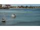 Beautiful water view of boats sailing near waterfront homes at 4525 Cove Cir # 705, St Petersburg, FL 33708