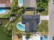 Aerial view of the home's backyard pool and canal front property at 4568 40Th S St, St Petersburg, FL 33711