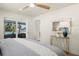 Cozy bedroom with a view of the pool and backyard through sliding glass doors at 4568 40Th S St, St Petersburg, FL 33711