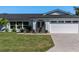 The front of the house has a lovely garden and a two-car garage at 4568 40Th S St, St Petersburg, FL 33711