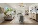 A large living room with hardwood floors and multiple couches at 4568 40Th S St, St Petersburg, FL 33711