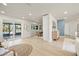 Open-concept space with dining area, leading to a bright outdoor pool and patio at 4568 40Th S St, St Petersburg, FL 33711