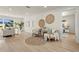 Open-concept living space showcasing stylish furnishings, natural light, and inviting decor at 4568 40Th S St, St Petersburg, FL 33711