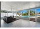Outdoor patio featuring comfortable seating and views of the fenced-in yard and in-ground swimming pool at 4568 40Th S St, St Petersburg, FL 33711
