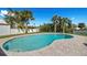 Beautiful backyard pool with a brick paver patio and lush landscaping at 4568 40Th S St, St Petersburg, FL 33711