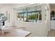 View of the pool area from the dining area showing a covered lanai at 4568 40Th S St, St Petersburg, FL 33711