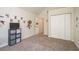 Bedroom with carpeted floors, a closet, and ample wall decor at 476 Rebstock Blvd, Palm Harbor, FL 34683