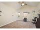 Spacious bedroom with neutral colored carpet, vaulted ceilings, and ample natural light at 476 Rebstock Blvd, Palm Harbor, FL 34683