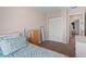 Bedroom featuring a twin bed, closet, neutral color palette, and carpeted floors at 5162 Sunridge Palms Dr # 5162, Tampa, FL 33617