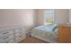 Bedroom showcasing natural light, a neutral color scheme, and carpeted flooring at 5162 Sunridge Palms Dr # 5162, Tampa, FL 33617