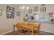 Cozy dining area featuring a wooden table, decorative lighting, and adjacent kitchen access at 5162 Sunridge Palms Dr # 5162, Tampa, FL 33617