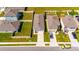 Aerial view of a neighborhood with manicured lawns, fenced yards, and neatly arranged homes at 5617 Flagstone Trl, Palmetto, FL 34221