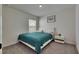 Bedroom featuring carpet, a queen bed, and a window at 5617 Flagstone Trl, Palmetto, FL 34221