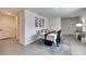 Bright dining area featuring modern decor, tile flooring, and a stylishly set table at 5617 Flagstone Trl, Palmetto, FL 34221