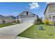 Beautiful single-Gathering home featuring an attached two-car garage and curb appeal at 5617 Flagstone Trl, Palmetto, FL 34221