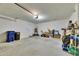 A functional garage space, perfect for storage with overhead lighting and easy access to utilities at 5617 Flagstone Trl, Palmetto, FL 34221