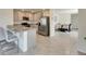 Kitchen featuring a granite countertop bar area at 5617 Flagstone Trl, Palmetto, FL 34221