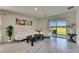 Bright living room with contemporary furnishings and view to the outside at 5617 Flagstone Trl, Palmetto, FL 34221