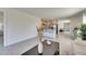 Spacious living area with tile floors, flowing into kitchen with stainless steel appliances at 5617 Flagstone Trl, Palmetto, FL 34221