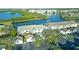 Scenic aerial view of the condo complex with waterfront views and lush landscaping at 6401 99Th N Way # 15C, St Petersburg, FL 33708