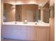 The primary bathroom has a large double sink vanity with storage at 6401 99Th N Way # 15C, St Petersburg, FL 33708