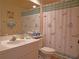 Full bathroom with tub and shower combination and a themed shower curtain at 6401 99Th N Way # 15C, St Petersburg, FL 33708