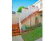Exterior shot featuring well-maintained stairs with lush landscaping and charming decorative dragonflies at 6401 99Th N Way # 15C, St Petersburg, FL 33708