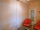Covered and enclosed lanai with sliding doors and comfortable seating at 6401 99Th N Way # 15C, St Petersburg, FL 33708