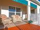 Cozy patio with wicker furniture, offering a charming outdoor seating area at 6401 99Th N Way # 15C, St Petersburg, FL 33708