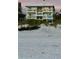 Exterior view of a three story beach house at 712 Beach Trl # C, Indian Rocks Beach, FL 33785