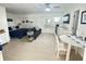 Cozy studio with a queen bed, living area with sleeper sofa, and a kitchen with a dining area at 712 Beach Trl # C, Indian Rocks Beach, FL 33785