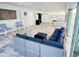 Spacious patio features stylish seating, ceiling fans, and a recreational game table for outdoor enjoyment at 712 Beach Trl # C, Indian Rocks Beach, FL 33785