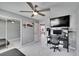 Office with desk setup, ceiling fan and sofa, perfect for study or remote work at 728 Camrose Dr. Dr, Brandon, FL 33510