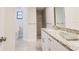 Modern bathroom featuring a granite countertop and a stand-up shower at 8436 Cameo St, Spring Hill, FL 34608